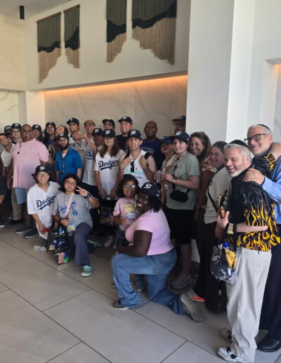 group photo of event attendees from the Village