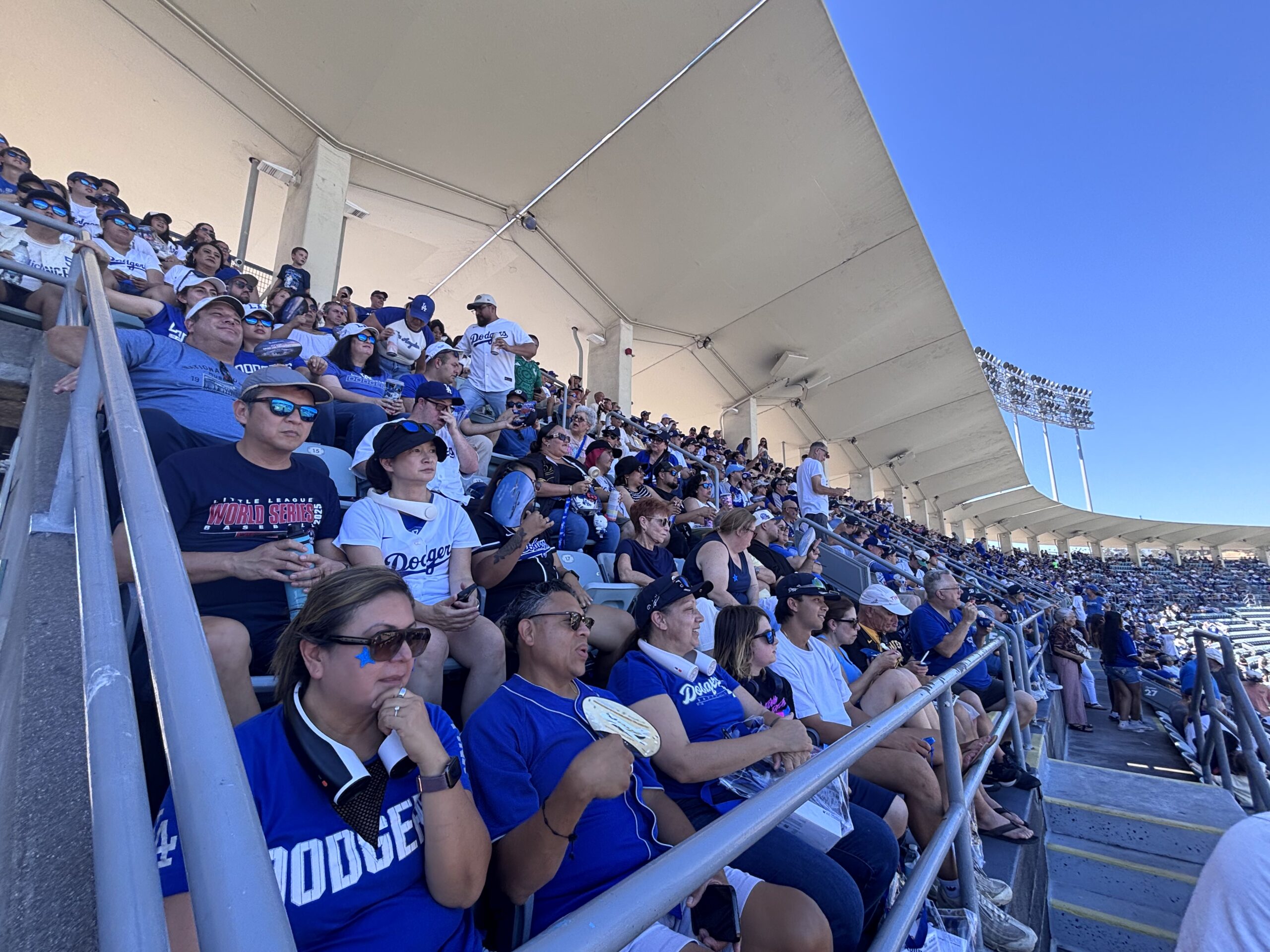 large group of etta and village dodgers fans in the stands